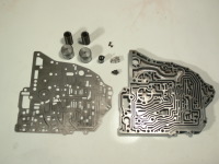 Übersetzung unter dem hinteren Getriebedeckel